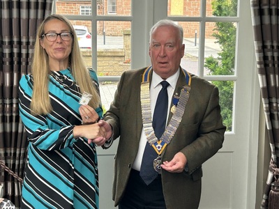 Presentation of President Elects badge to Barbara Goudie-Bradford 